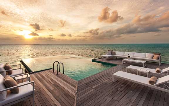 The pool and ocean at Conrad Maldives Rangali Island, Maldives