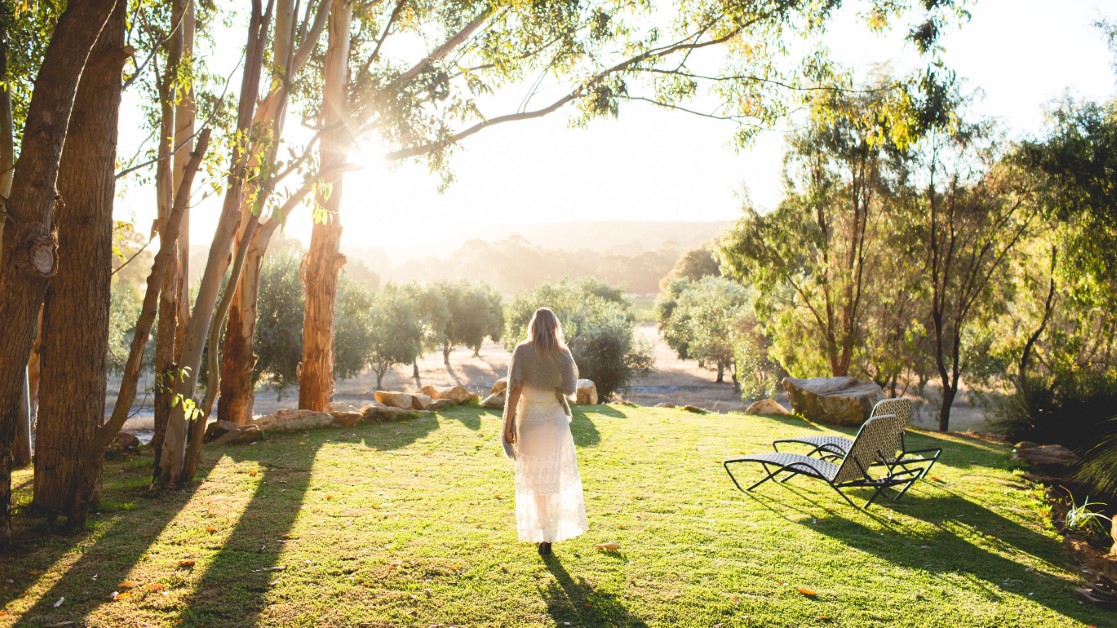 The sunlit grounds of Empire Retreat, Yallingup