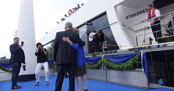 AmaWaterways co-owner Rudi Schreiner hugging Jackie as passengers look on from AmaViola. (photo: Colleen McDaniel) AmaWaterways co-owner Rudi Schreiner hugging Jackie as passengers look on from AmaViola.